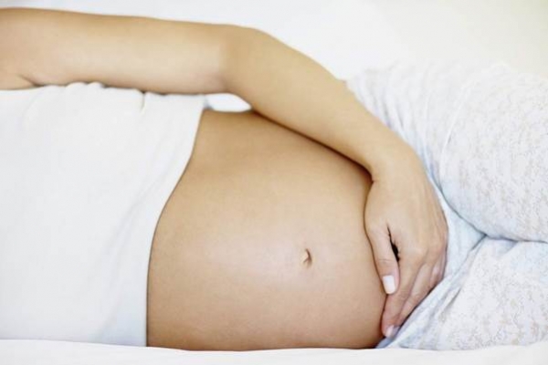 Почему болит низ живота при беременности