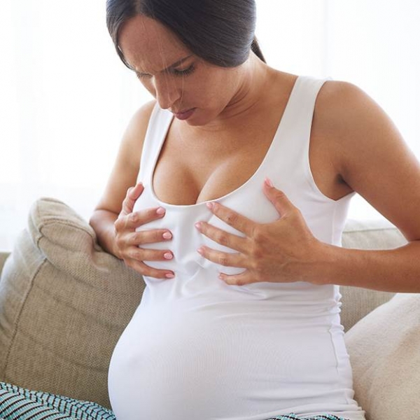 Почему перестала болеть грудь во время беременности