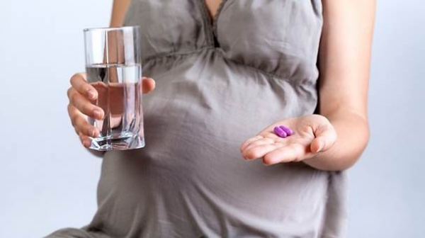 Почему тянет низ живота на 8 неделе беременности